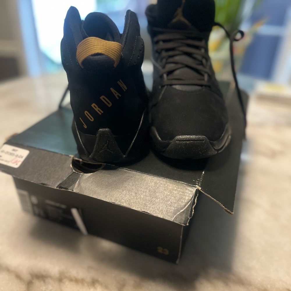 Jordan Sneakers in Black with Gold Highlights